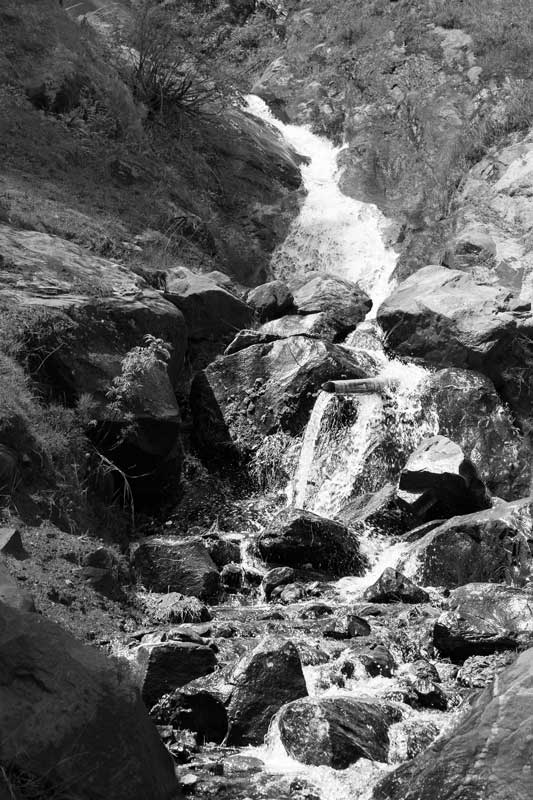 A mountain stream and 'gadera' near Harsil town in district Uttarkashi, Uttarakhand